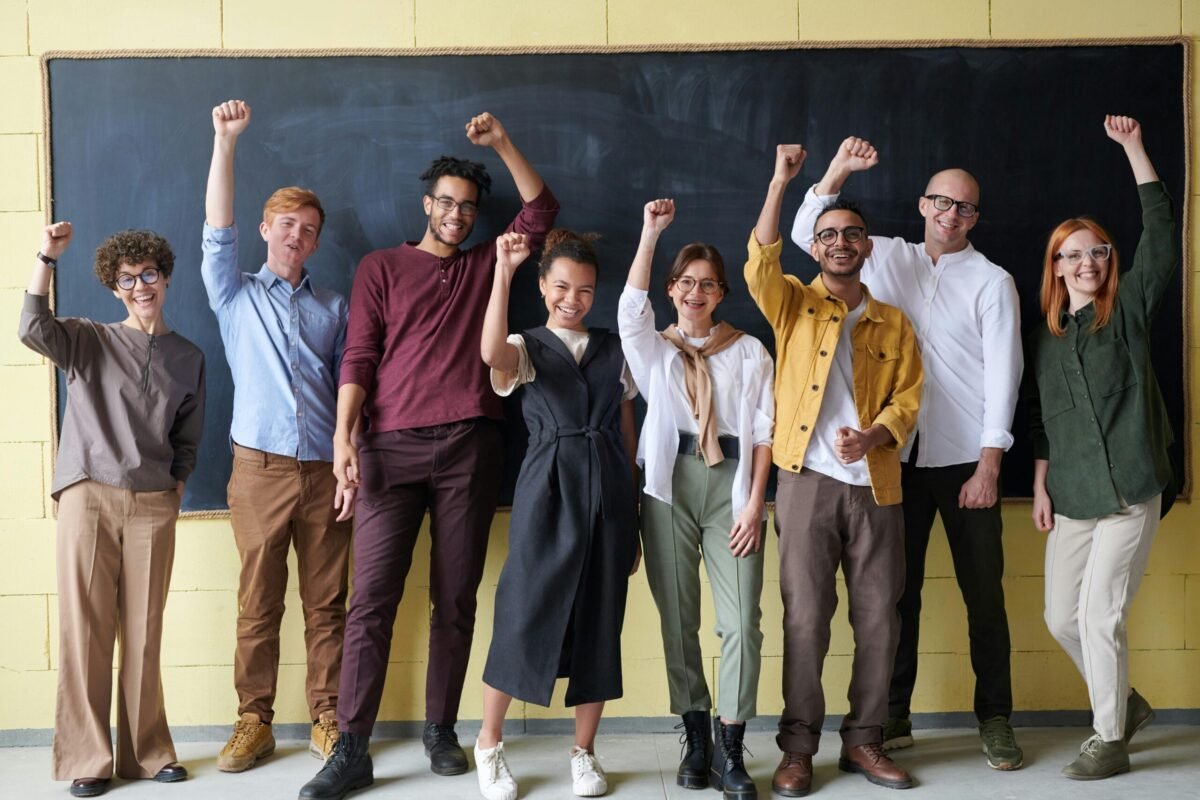 Group of teachers in front of a blackboard