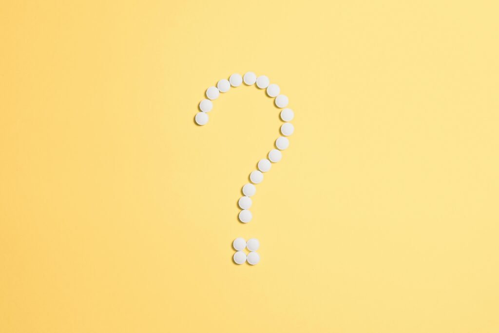 Question make made of white dots on yellow background.