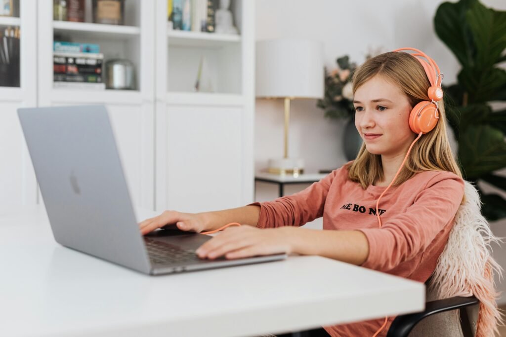 Female student engaged in digital learning.
