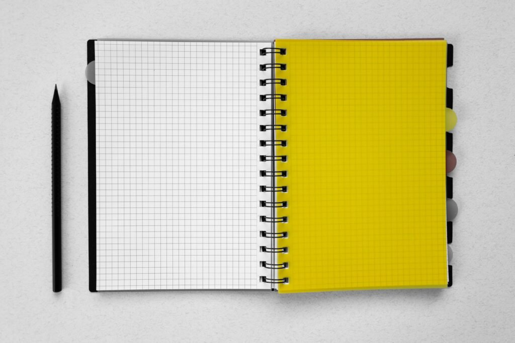 Blank notebook to write information about the school directories.