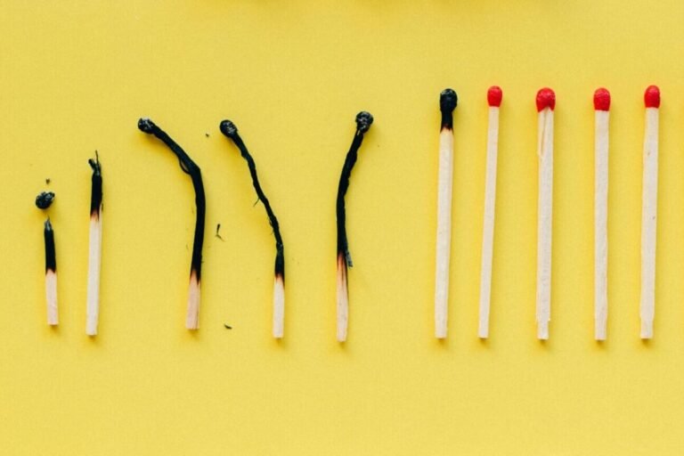 Row of matches at different levels of having been burned.