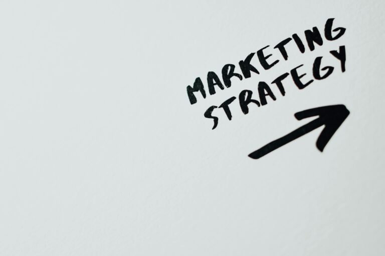 Marketing strategy written on a whiteboard.