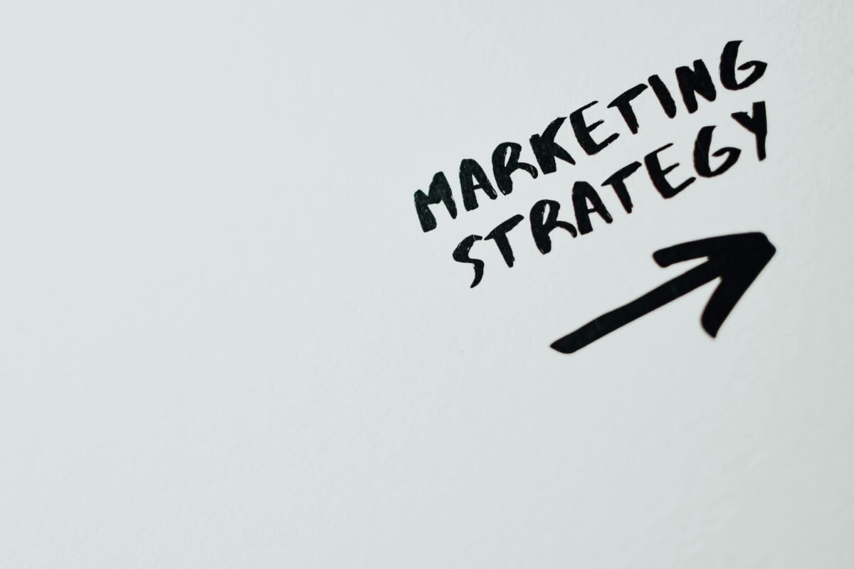 Marketing strategy written on a whiteboard.