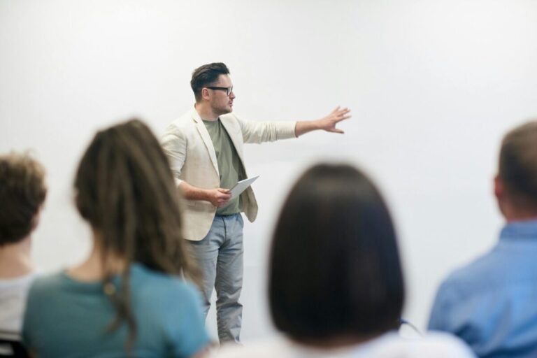 Adjunct professor teaching a class of students.