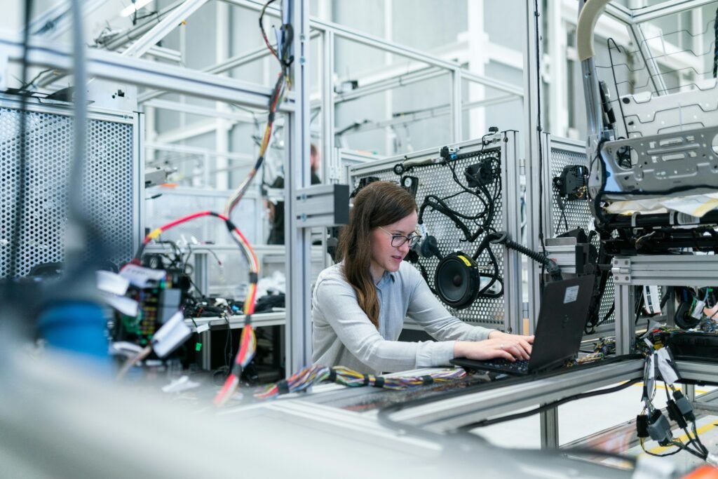 Woman in information technology office area.
