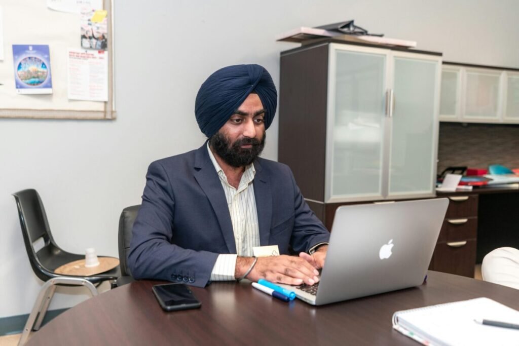 Accountant entering data into computer.