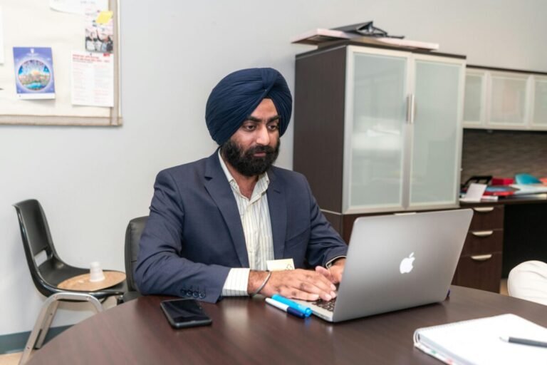 Accountant entering data into computer.