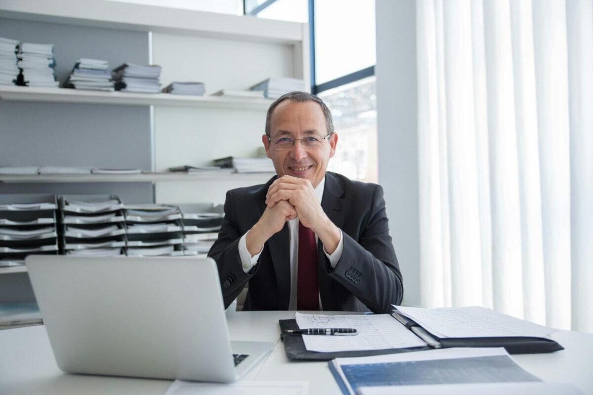 Career mentor at their desk.