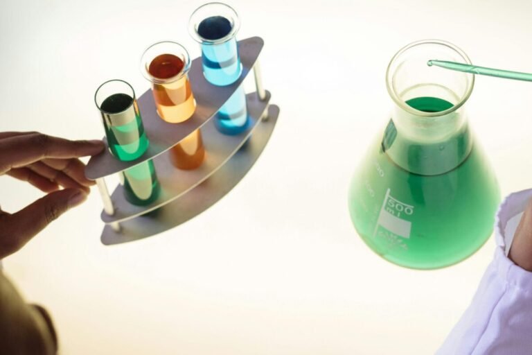 Beakers and test tubes that are part of a science class experiment.